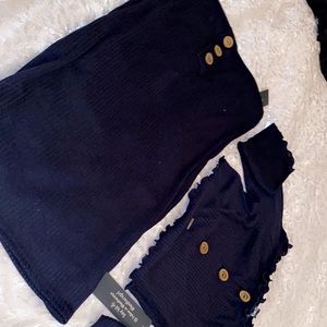 Black 2 piece outfit.